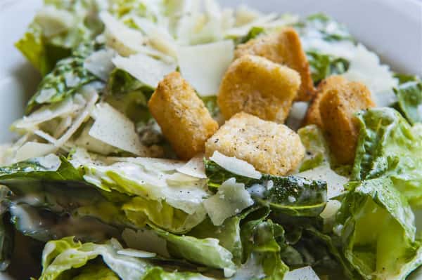 caesar salad with croutons and parmesan cheese