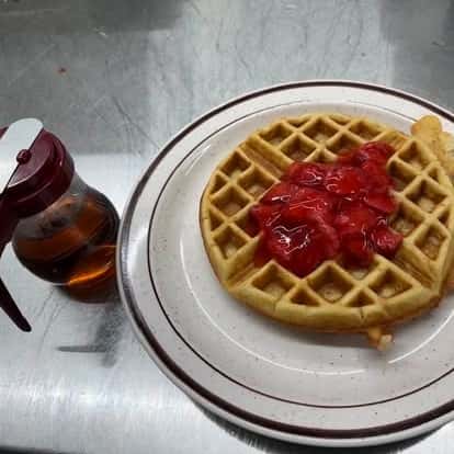 Waffle with strawberry toppings