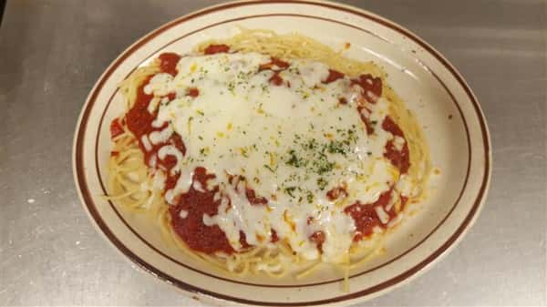 Spaghetti and meat sauce with melted mozzarella