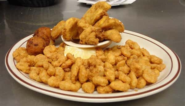 Fried chicken tenders served with chicken nuggets