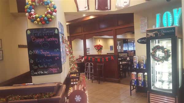 Entrance of dining area with Christmas decorations up.