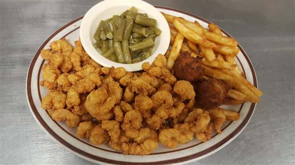 Fried chicken nuggets served with French fries and string beans
