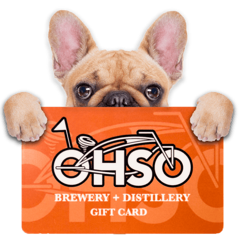 dog holding gift card