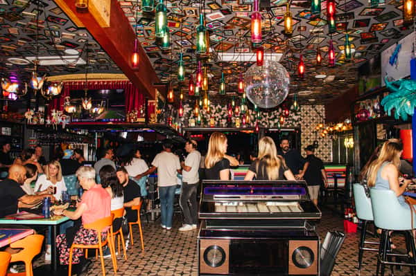 A lively and colorful event space with a disco ball and colorful lights located in Phoenix AZ at OHSO Party House