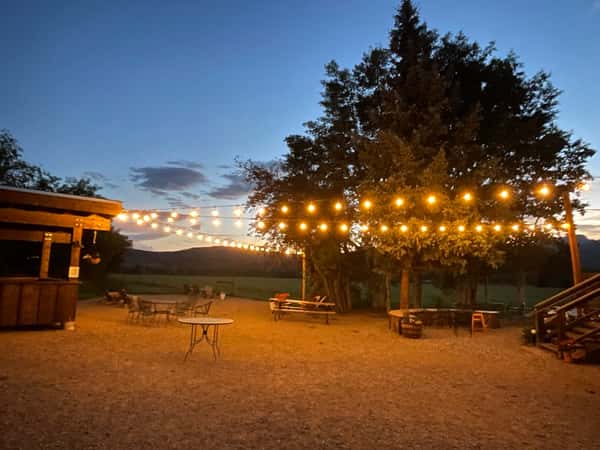 Outside string of lights at sunset