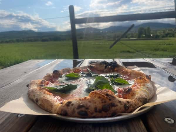 Pizza with a sunny view