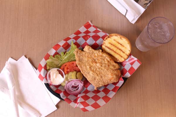 fried chicken sandwich with water