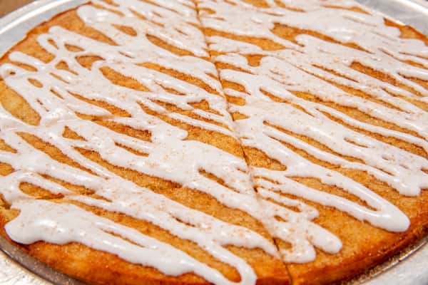 Cinnamon sticks dessert drizzled with sweet icing at The Gaslight Pizza & Grill in Huntingburg, Indiana