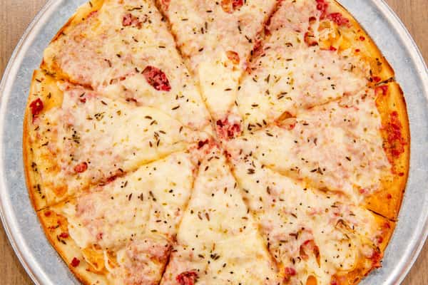 Reuben-style pizza with corned beef, sauerkraut, and melted cheese at The Gaslight Pizza & Grill in Huntingburg, Indiana