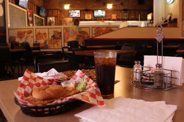 fried chicken sandwich with cola