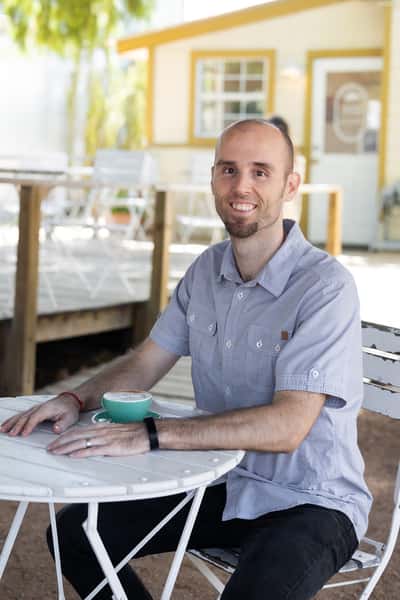 Guest enjoying hot coffee and brunch