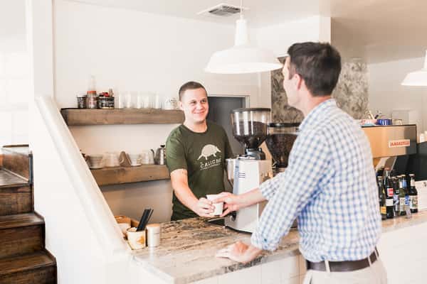 Happy customer at Caliche Coffee