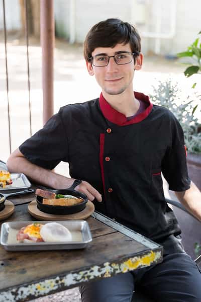 Guest enjoying hot coffee and brunch