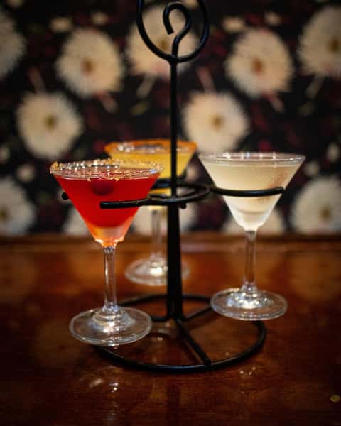 holiday martini flight cran pom gngerbrd man harvest apple