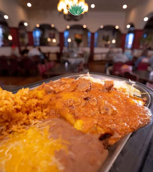 Meat Enchiladas with chile verde on top