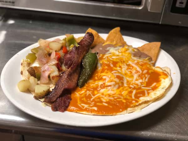 Quesadilla ranchero with basted eggs, and bacon