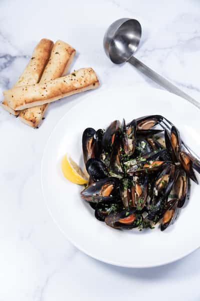 Bread sticks and a dish of oysters