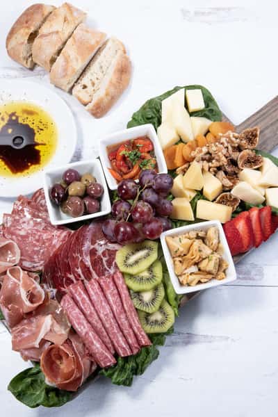 Table of hams, fruit and cheese