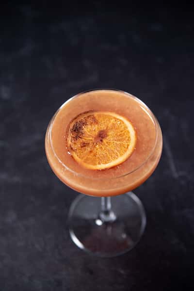 Cocktail drink with orange slice