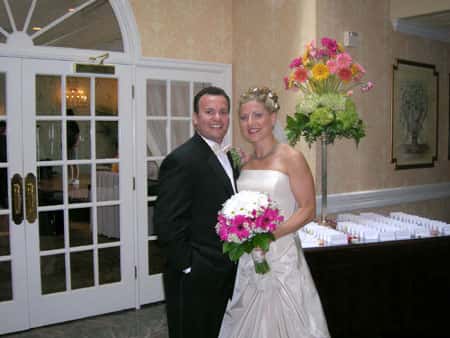 bride and groom smiling for picture