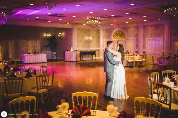 couple dancing in large ball room