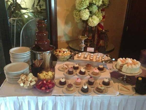 buffet table with various desserts