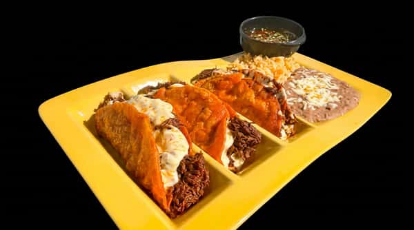 Four tacos with meat and cheese on a yellow divided plate, with rice, refried beans, and a small bowl of sauce.
