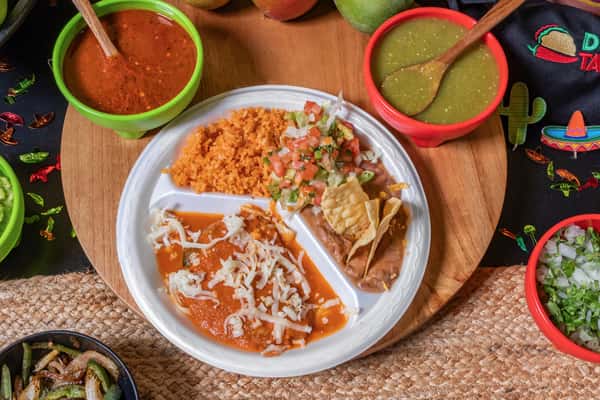 Traditional Mexican combo plate featuring cheese enchiladas smothered in red sauce, served with seasoned Mexican rice, refried beans topped with pico de gallo and tortilla chips, surrounded by red and green salsa bowls.