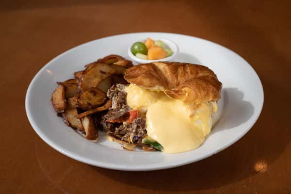 Philly Steak and Egg Croissant Benedict*