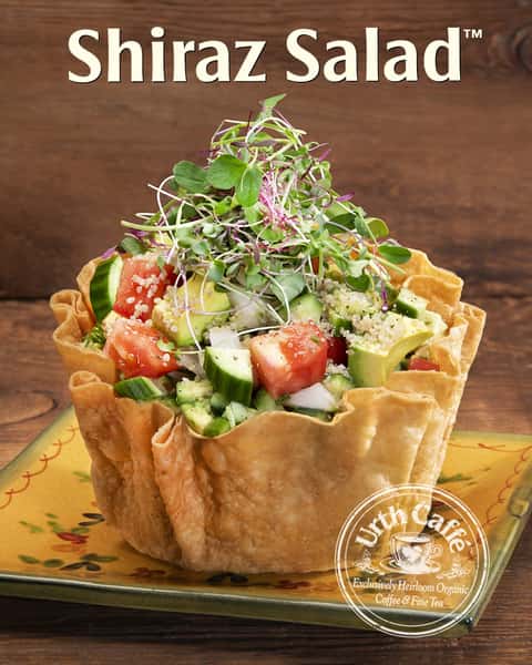It's Back! The Shiraz Salad is available, new and improved, at your nearest Urth Caffé*!
A Persian recipe, perfected by Master Chef and Baker Davide Giova, based on the famous cucumber salad of Shiraz made with organic white quinoa, Persian cucumbers, sweet onion, heirloom tomatoes, avocado, fresh herbs, and Urth's exclusive Supergreens — microgreens from a local, organic regenerative L.A.-based farm, the Mulholland Estate.
Want to learn more about Urth Caffé's promise of procuring the freshest, organic ingredients? Visit our Urth Blog, written by Resident Writer Lisa Mouhibian, recounting Master Chef and Baker Davide Giova's tour across the Mulholland Estate, a proud partner of Urth Caffé that shares the goal for sustainable, eco-friendly farming practices.
*Shiraz Salad is available at all SoCal locations except Urth Orange and Urth Laguna Beach.
#urthcaffe #shirazsalad #organicingredients #microgreens #sustainablefarmingpractices