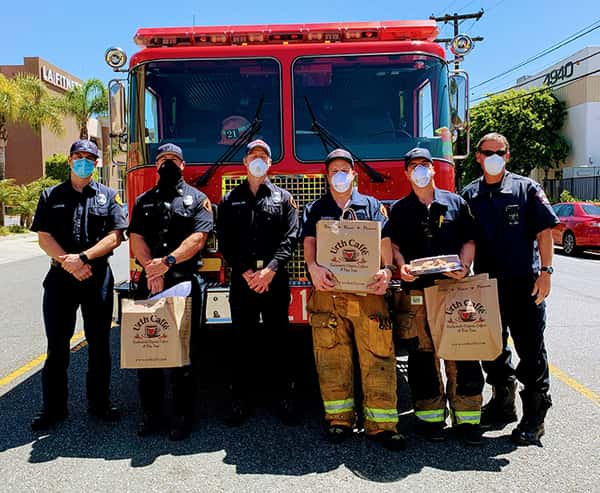 Lawndale Firetruck front with 6 firemen Urth Caffé brown paper food bags.