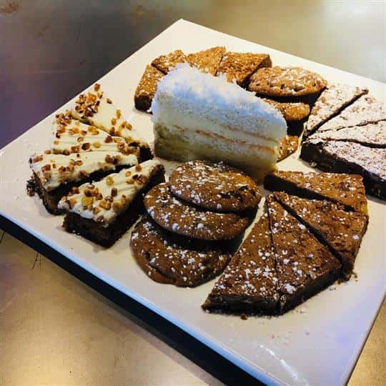 Assorted desserts on dish.