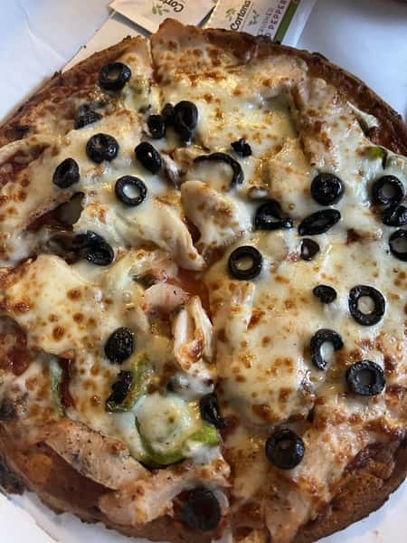 Chicago-style chicken kabob pizza with grilled chicken, peppers, onions, and mozzarella cheese