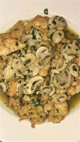 chicken with mushrooms in a dish