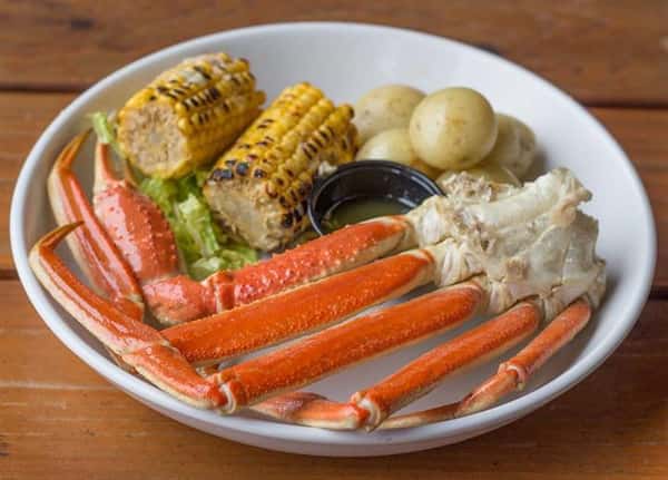 crab legs with potaties and corn