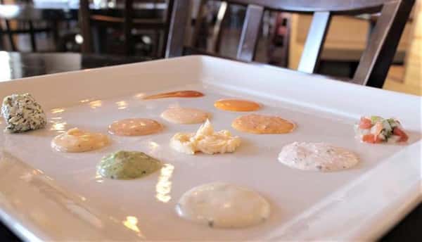 various dipping sauces on a plate