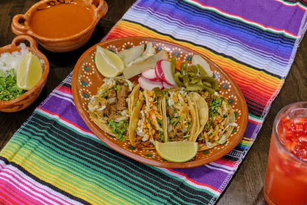 Tacos on top of a colorful cloth