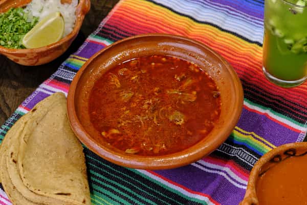 Birria on top of a colorful cloth