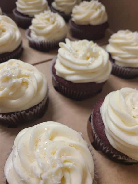 red velvet cupcakes with sugar frosting