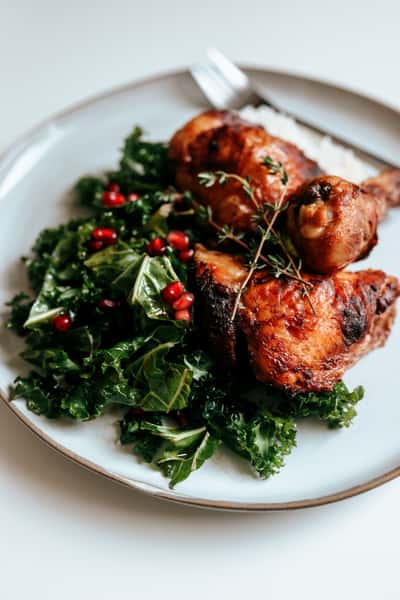 plate of chicken and greens