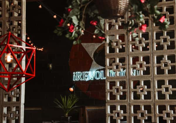 Interior decor with seasonal red flowers and red lighting