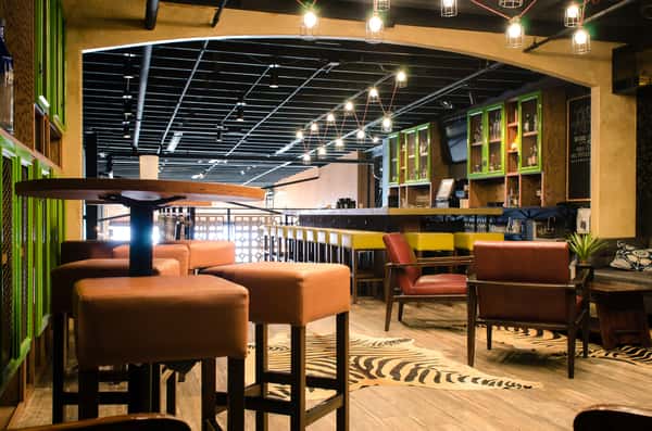 Peanut butter leather bar stool seating in the Tequila Library
