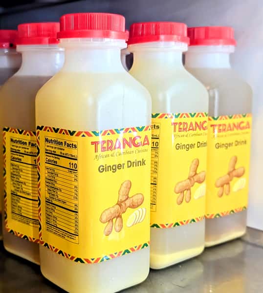 Bottles of Teranga ginger drink featuring bold, spicy flavor — a traditional West African beverage known for its invigorating and digestive properties.