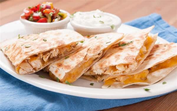quesadilla with chicken and hand made salsa plus yogurt and sour cream