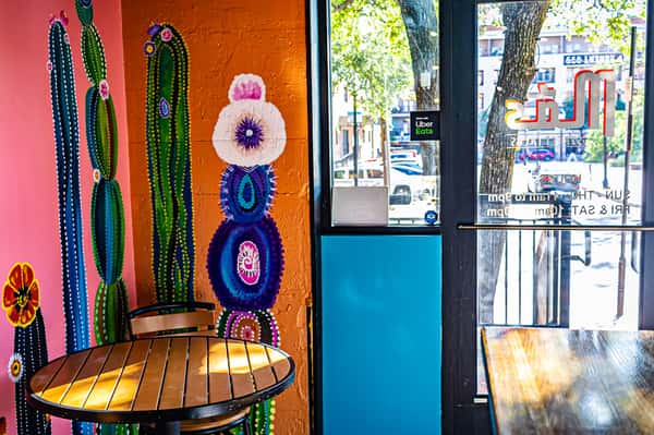 wall art at Mas Tacos