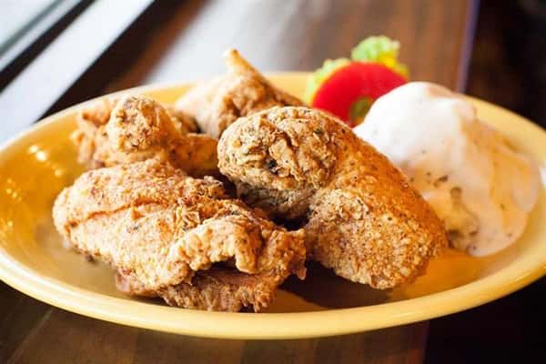 fried chicken plates with vegetables
