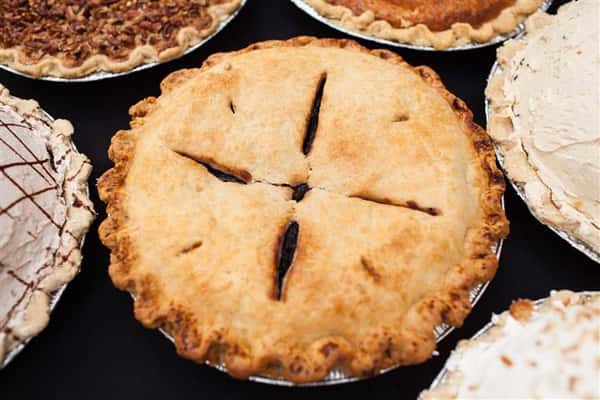 fresh apple pie along with other pies