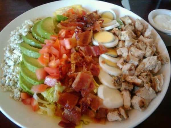 chopped lettuce * diced chicken * bacon * tomato * avocado * hard boiled egg * bleu cheese