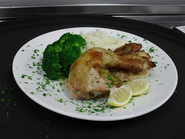 baked chicken with a side of white rice and steamed broccoli
