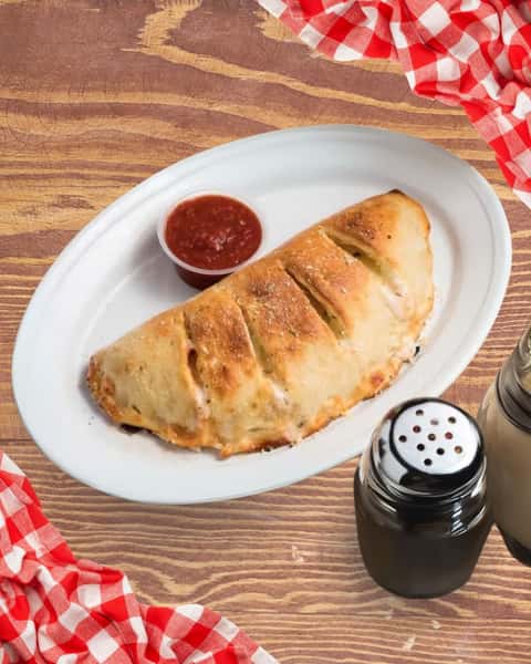 The Acropolis Calzone—filled with classic flavors and baked to perfection. 

#Calzone #BatonRougeEats